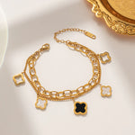 Load image into Gallery viewer, Black &amp; White Clover Charm Bracelet
