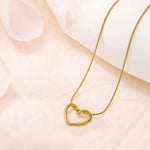 Load image into Gallery viewer, Minimalist Gold Heart Necklace
